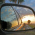 Reflectie in autospiegel